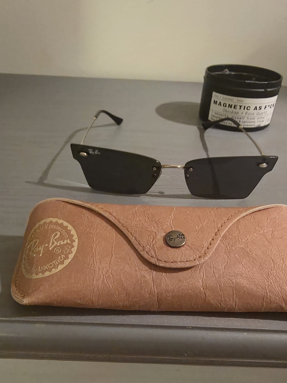 Ray-Ban Women’s Black Lens Gold Bridge Rimless Sunglasses